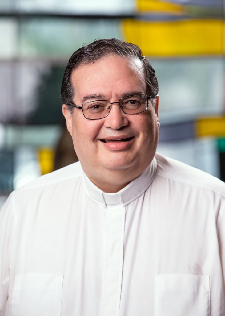 Rev. Carlos E. Vega: Pastor